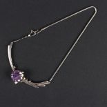 A silver and amethyst modernist necklace, set a circular rough amethyst crystal applied pearls,