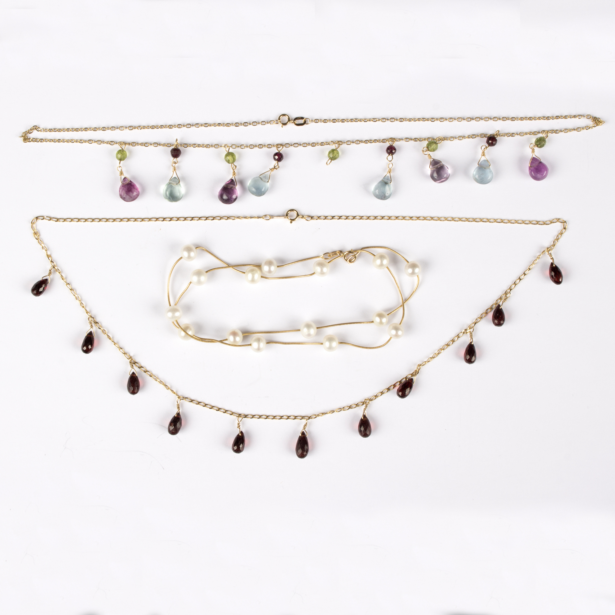 A 14K gold and cultured pearl necklace, the single snake type chain set fifteen cultured pearls,