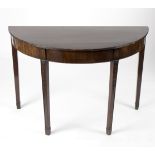 A George III mahogany D-shaped table, on square tapering legs with trails of harebells,