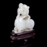 A pale celadon jade carving of a Bìxié, Qing Dynasty early 19th Century,