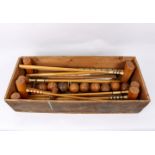 A collection of Universal croquet mallets, balls, etc.