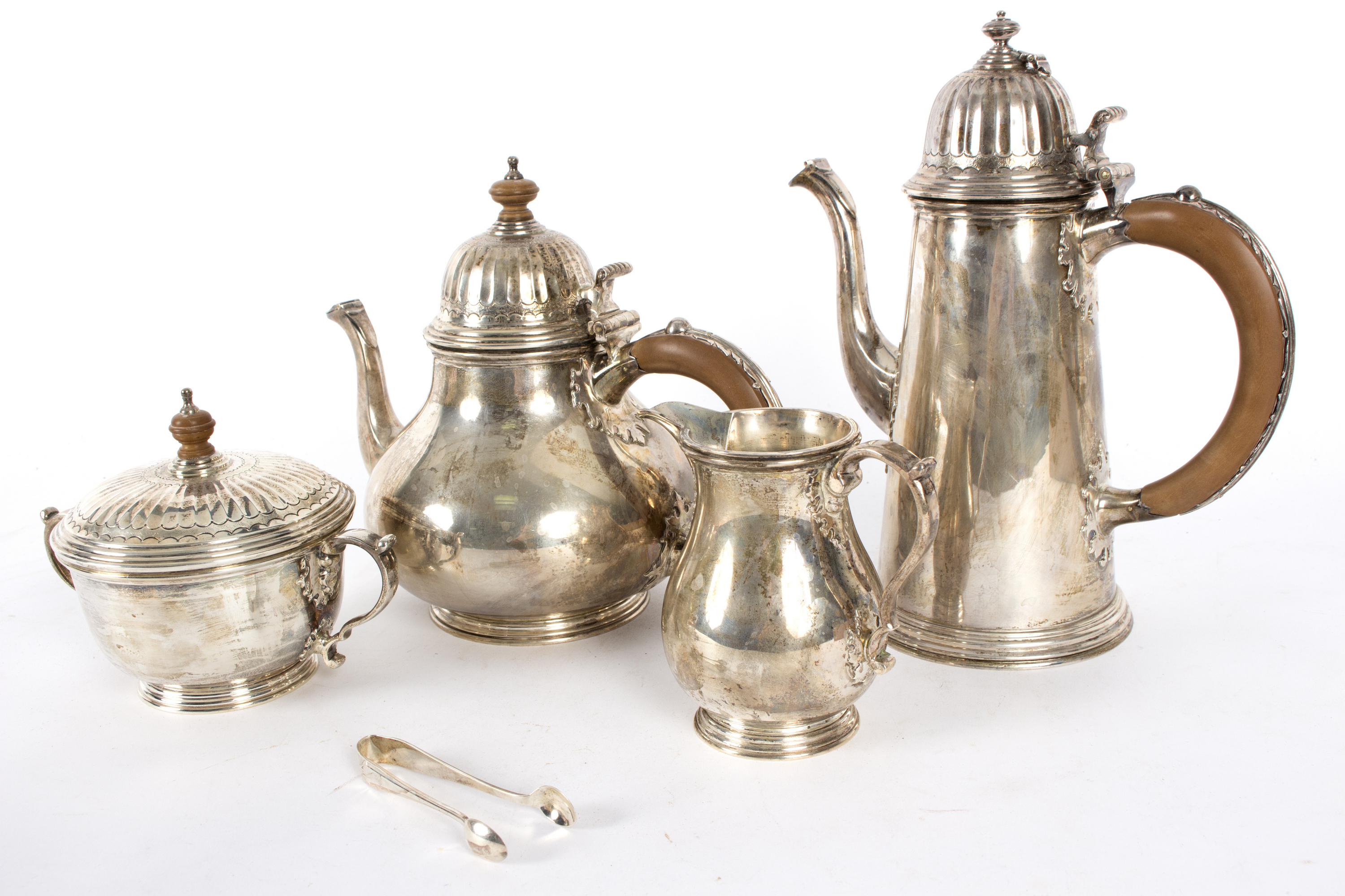 A silver four-piece tea set, William Comyns & Sons Ltd.