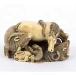 A Japanese ivory netsuke, carved zodiac of Animals, signed Meigyo Kusai, 2.
