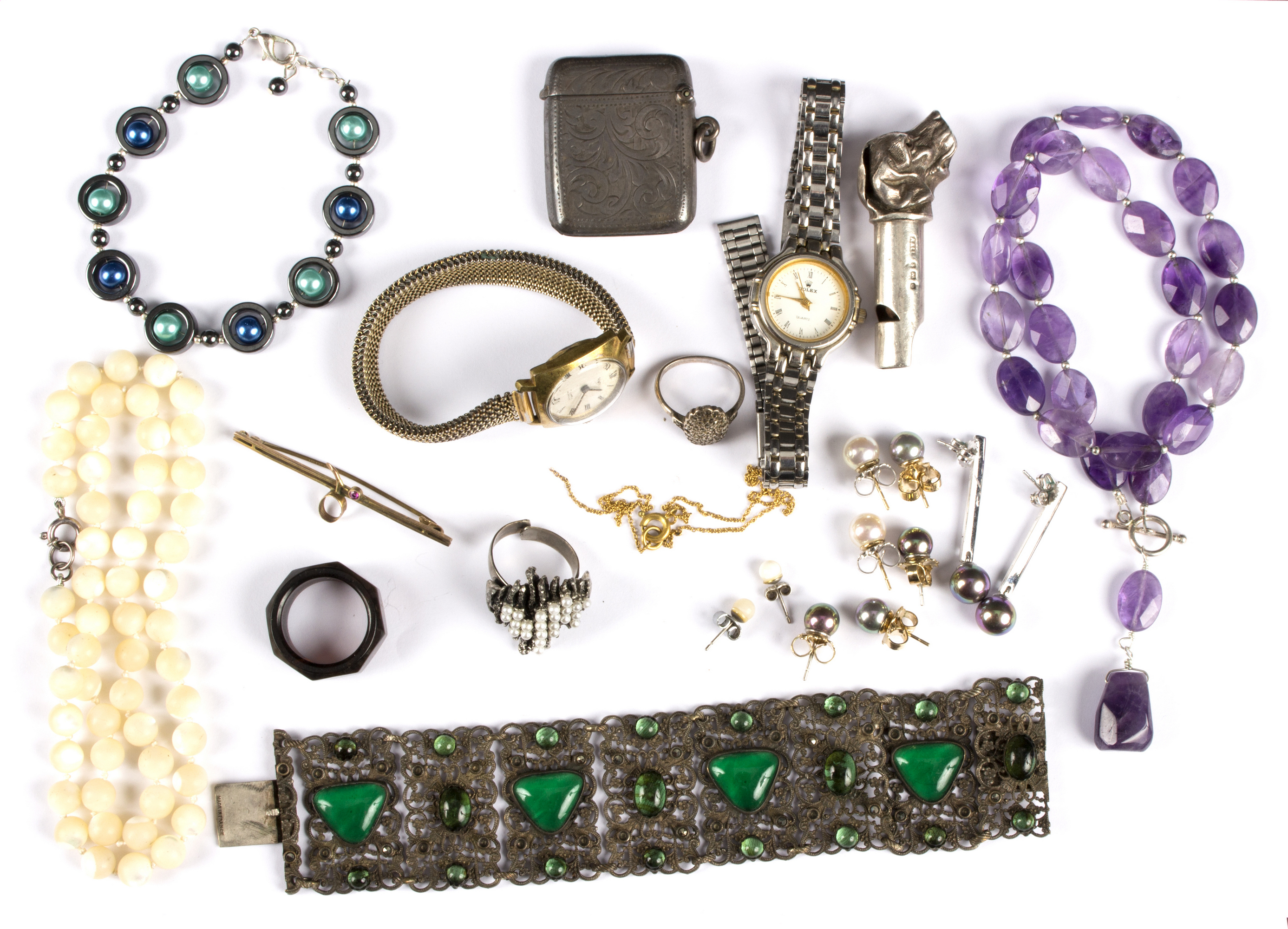 A small group of costume jewellery to include a Victorian silver whistle, a silver vesta case,