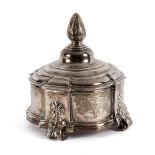 A mid 18th Century Dutch silver tobacco box, possibly Lucas Claterbos, the cover with flame finial,