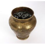 A Persian brass vase with reticulated pierced and engraved decoration and reserves of alternating