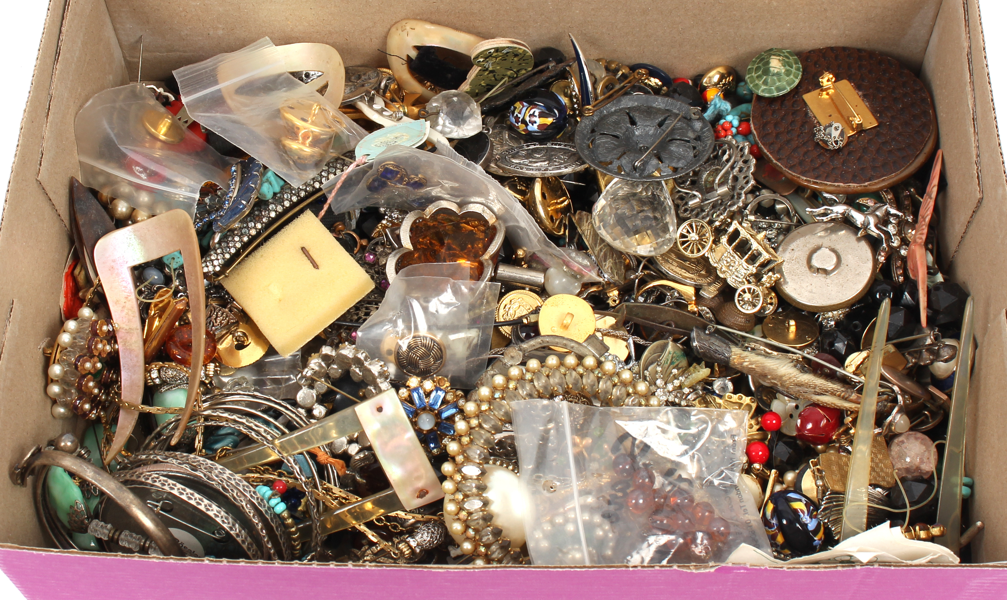 A quantity of costume jewellery including brooches, buttons, bangles etc.