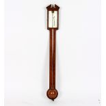 An early 19th Century mahogany stick barometer, the silvered dial signed Gilbert & Sons, London,