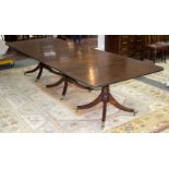 A Regency style mahogany triple-pedestal dining table,