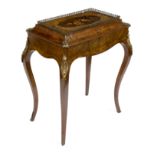 A mid 19th Century French walnut and gilt metal mounted jardinière table,