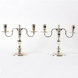 A pair of silver two-branch, three-light candelabra, JCL, London 1955,