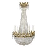 A Regency style glass chandelier with gilt metal coronet finial,