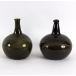 A large 18th Century flecked glass wine bottle labelled Trolaten,