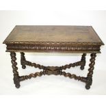 A late 19th Century carved oak table,