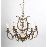 A gilt metal six-light chandelier of classical design with central putto support,