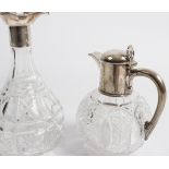 A spherical cut glass claret jug, the silver mounts, HW & Co.