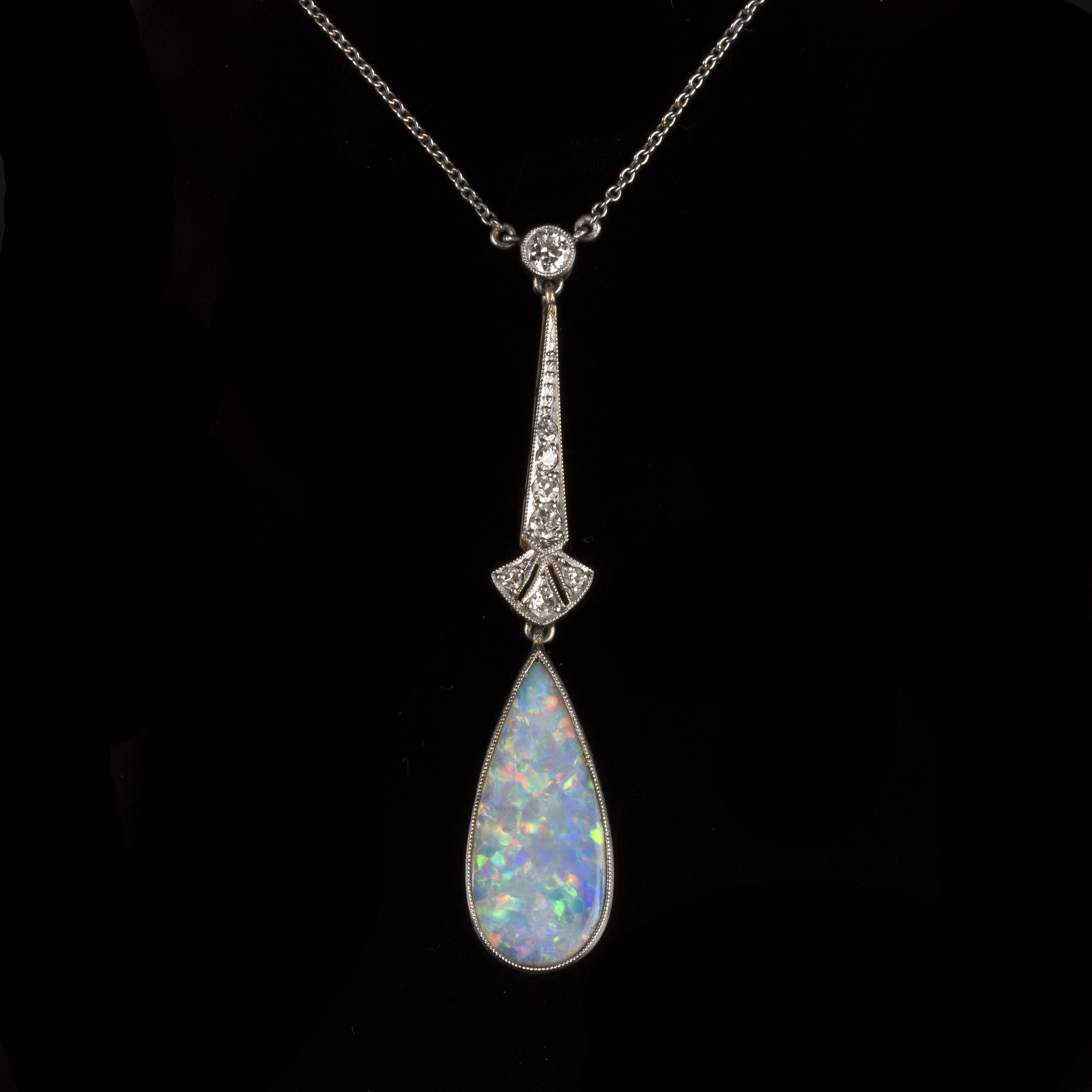 An Art Deco opal and diamond pendant,