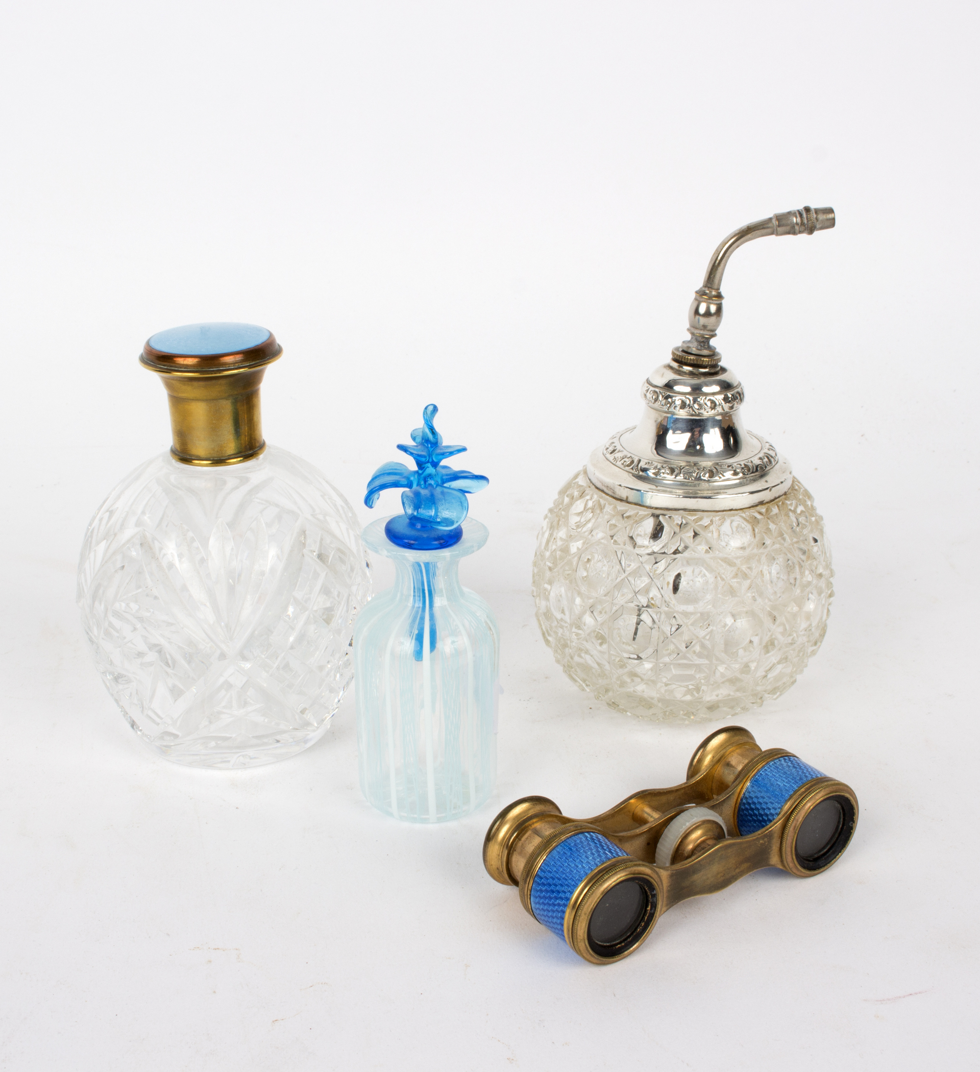 A cut glass scent bottle with silver mounts, a pair of opera glasses,