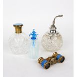 A cut glass scent bottle with silver mounts, a pair of opera glasses,