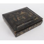 A Chinese export lacquer gaming token box, damages, the cover decorated boys playing by a pagoda,