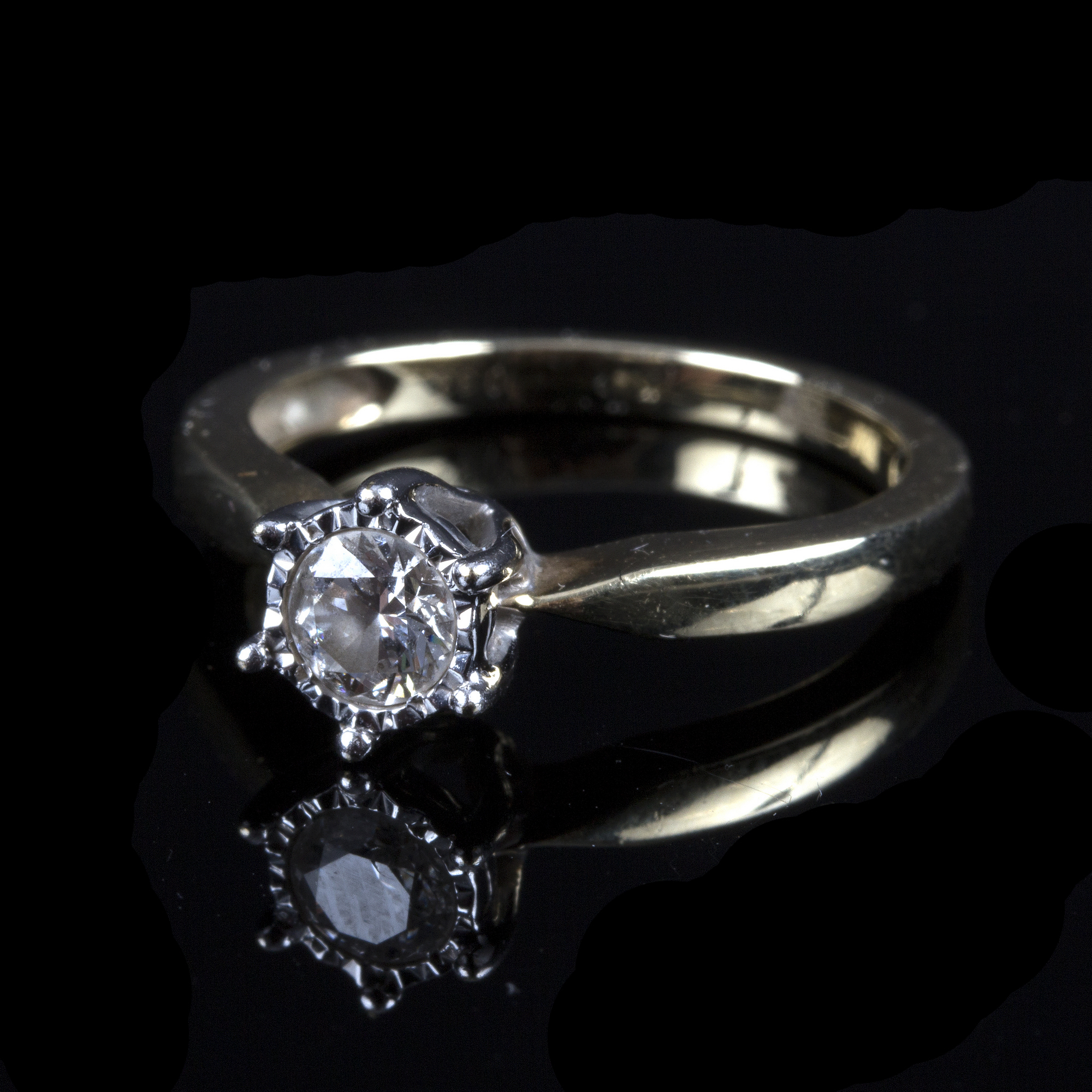 A diamond solitaire ring, the six claw set diamond measuring approximately 0.
