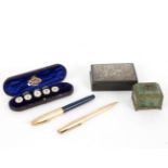 A part set of five mother-of-pearl buttons, with 9ct gold backs, cased, a Sheaffer fountain pen,