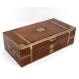 A gentleman's George III mahogany and brass bound shaving/dressing case,