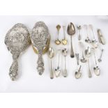 A silver backed hand mirror and brush, Chester 1901/02, decorated figures and sundry teaspoons etc.