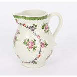 A Lowestoft milk jug painted flower sprays,