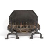 A basket grate and cast iron fire back