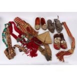 A quantity of Indian sashes, a woven metal wire belt, various beaded slippers etc.