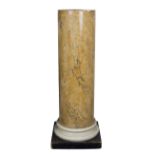 A 19th Century simulated Siena marble scagliola column on white socle and square base,