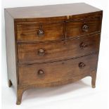 A Regency bowfront chest of two short over two long drawers, 89.