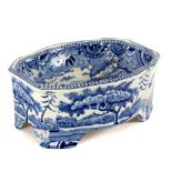 A Staffordshire blue and white dog bowl, transfer printed with rural scenes, 22.