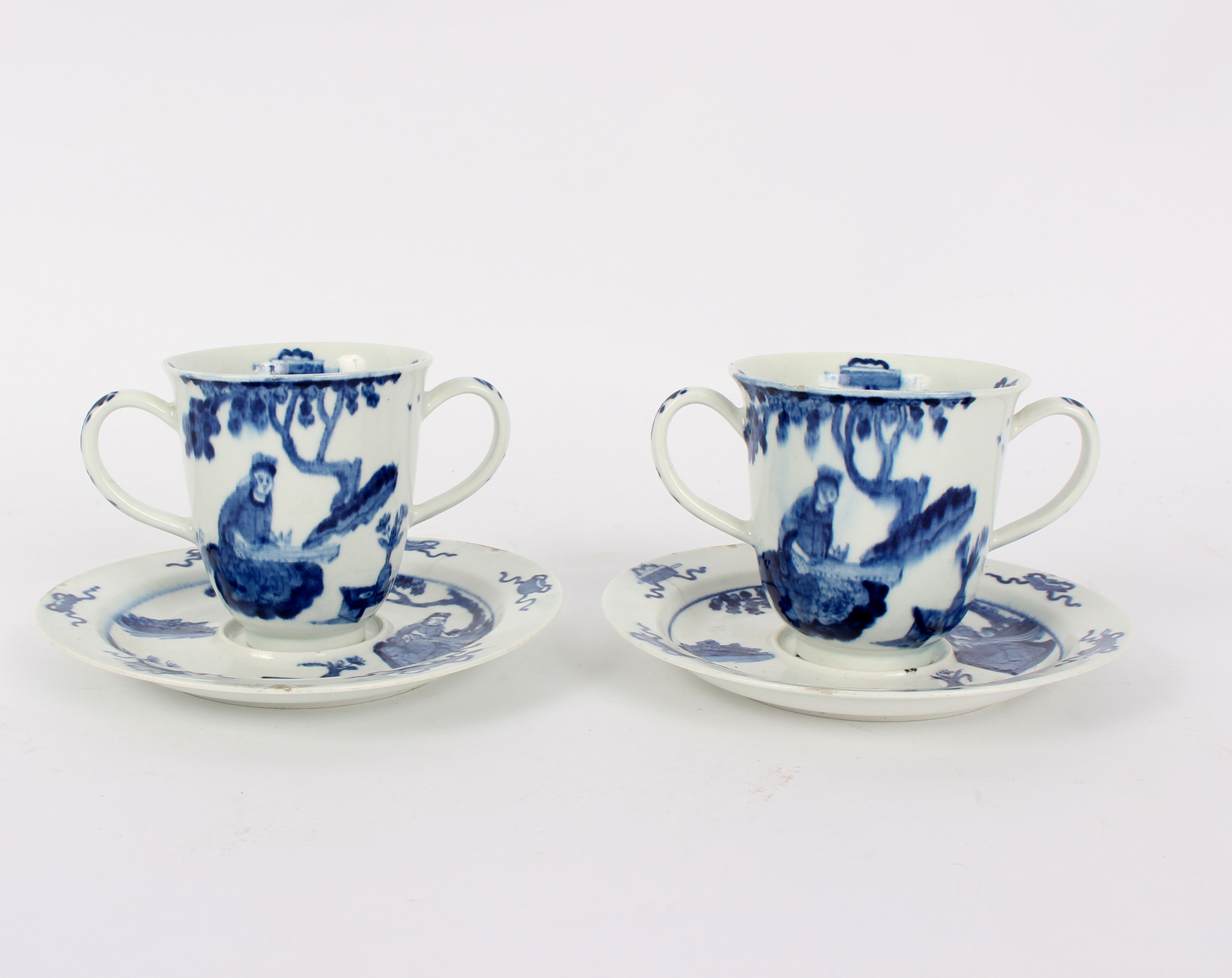 A pair of Bow 'Koto player' pattern chocolate cups and saucers, circa 1760,