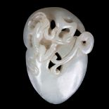 A pale celadon jade carving of a kylin surmounting a cloud, 19th Century, 6.