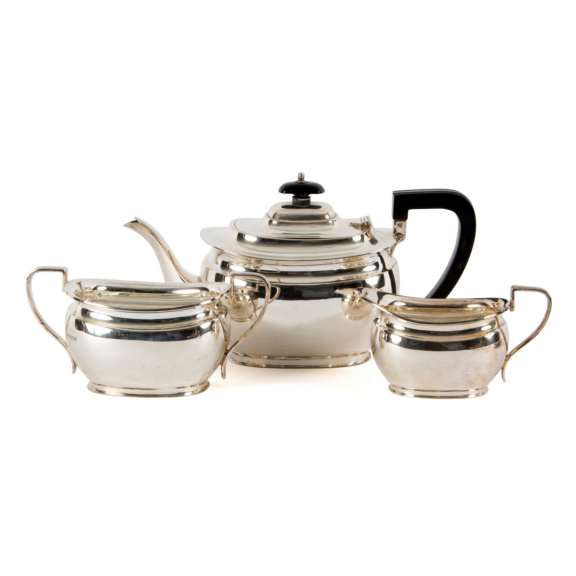 A three-piece silver tea service, HA, Sheffield 1932, approximately 1,