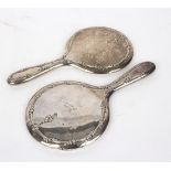 A pair of silver backed hand mirrors,