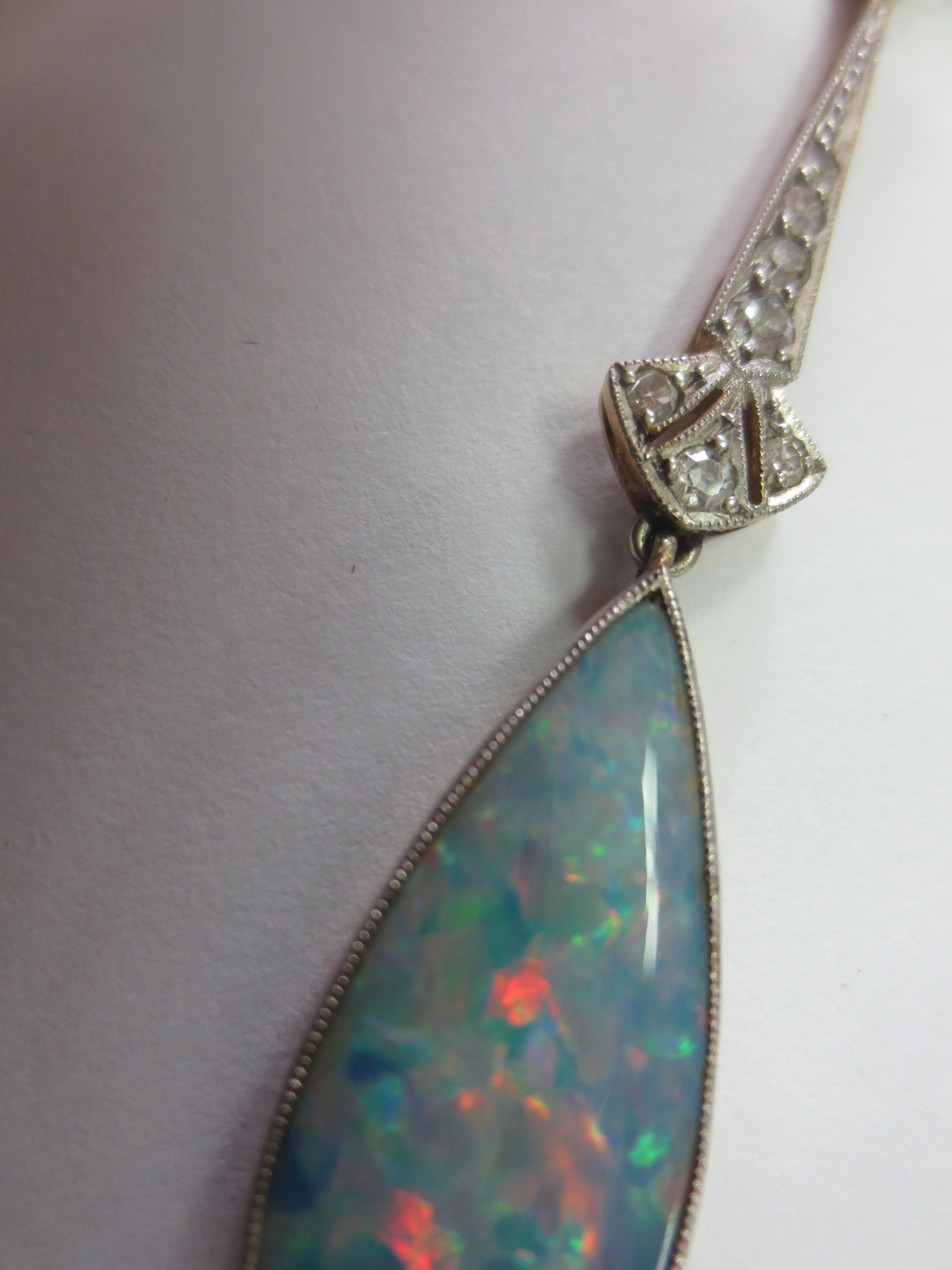 An Art Deco opal and diamond pendant, - Bild 2 aus 3