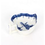 A Derby blue and white leaf-shaped butter boat with stalk handle,