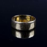 A 22ct gold wedding band, approximately 6.