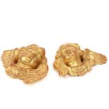 A pair of gilt plaster cherub mask wall appliques,