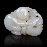 A pale celadon jade carving of a boy with a box, 19th Century,