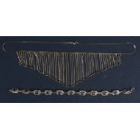 A 14K gold fringe necklace and an enamelled Egyptian scarab link bracelet,