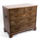 A George III mahogany chest of two long and three short drawers,