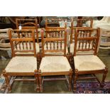(lot of 6) Provincial style side chairs, each with turned supports, a rush seat, and rising on