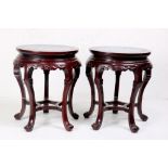 (lot of 2) Chinese wooden stools, with cloisonne tops featuring floral scrolls, all raised on