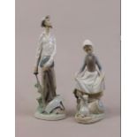 (lot of 2) Lladro figural group, consisting of a male figure modeled as standing with a fencing