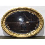 Neoclassical giltwood oval wall mirror, 43"h x 30.5"w