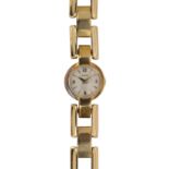 Lady's Cartier 18k yellow gold wristwatch Dial: round, white, applied Arabic and baton gold hour